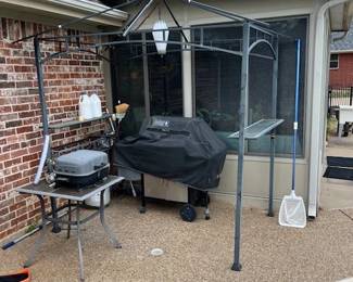 Here is another grill gazebo assembled with a couple of grills underneath it.