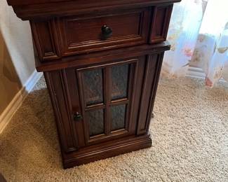 Side table with storage and a charging station