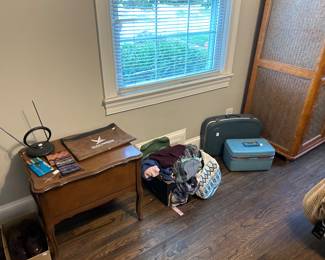End table, purses, Sears Travel Case, blue suitcase 