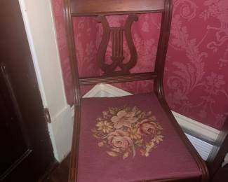 Needlepoint cushioned chair 