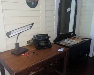 Wooden desk, typewriter & mirrored cabinet 