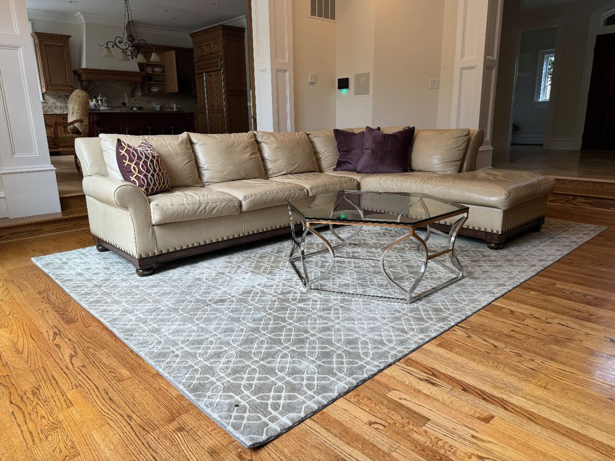 Leather Sectional (LAF 1 Arm Sofa- 43"D x 35"Back Height x 84"W / RAF Chaise - 43"D x 96"L x 35" Back Height) Bernhardt Glass Top Argent Metal Stainless Steel Cocktail Table (46"D x 18"H) & Rectangular Machine Made Carpet (13' x 9')