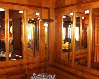 Six wall mirrors and floor lamp.