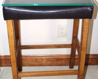 Leather stool w/glass top. 11" D x 17" W x 29" 1/2" H. Client used as a nightstand. Clever idea!