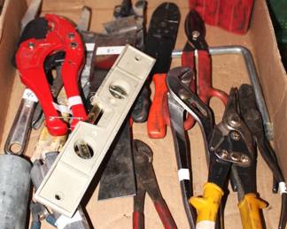 Various pliers and wrenches.