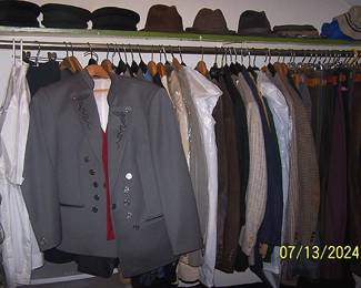 Third closet including German suits and hats