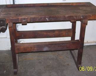 Primitive wood work bench w / vise