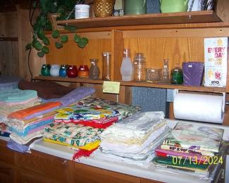 More towels, plastic tablecloths (some new)