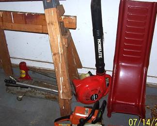 Stihl chainsaw, Homelite blower, floor jack, car ramps