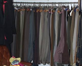 One of three closets containing men's clothing