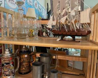 Wooden sailing ship, steins, antique pewter tankards
