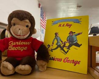 Curious George books and plush