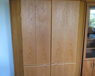 TRAPAZOIDIAL OAK ENTERTAINMENT ARMOIRE