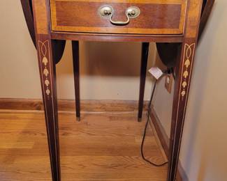 Small round drop leaf table with inlay