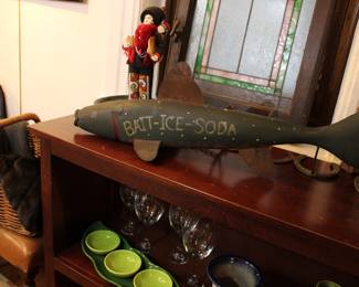 Whimsical wooden fish reading "Bait - Ice - Soda"