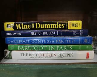 Assorted cookbooks including Cooks Illustrated The Best Chicken Recipes, Barefoot in Paris, Barefoot Contessa Parties, Food & Wine Best of the Best, Wine for Dummies