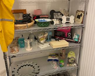 Household items, vintage wallpaper rolls, wire rack, irons, etc.