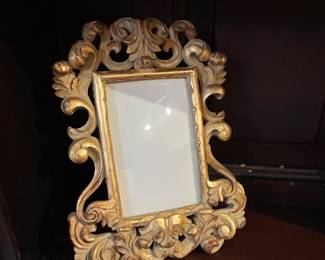 Rococo style gold painted easel photo frame