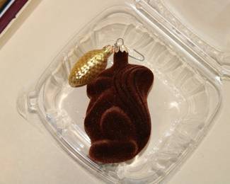 Flocked brown squirrel with gold acorn Christmas ornament