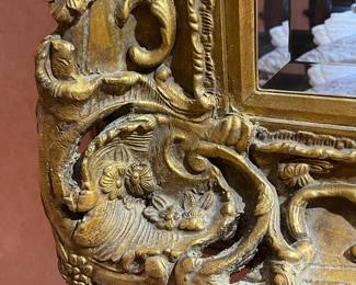 Corner detail of Massive Antique English Carved and Gilded Beveled Mirror
