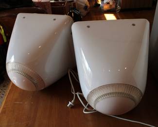 Backside of two Apple eMac all-in-one desktop computers