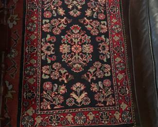 Small oriental throw rug, 4/5
