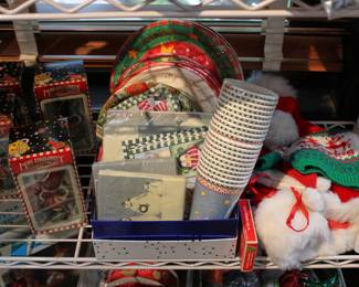 Christmas themed paper cups, plates, and napkins