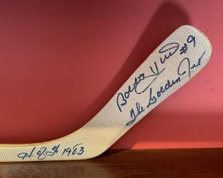 Signature detail of Bobby Hull #9 "The Golden Jet" Chicago Blackhawks signed hockey stick, Hall of Fame 1983