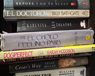 More books including "Billy Bathgate" by EL Doctorow, "Anna Karenina" by Leo Tolstoy, "The El Cholo Feeling Passes" by Barton, "DogPerfect" by Sarah Hodgson, "Cold Noses and Warm Hearts", "Cesar's Way" by Cesar Millan, "Vanity Fair" by William Makepeace Thackeray, "Beloved" by Toni Morrison