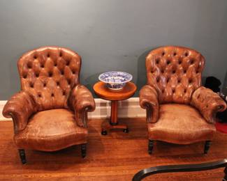 Pair of Ralph Lauren Home button tufted leather chairs (one seat with tear) and Biedermeier style side table with birds-eye maple top