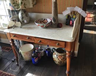 I just love this sweet marble topped table. 