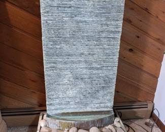 Lot 786: Peaktop brand fountain with rippled slate and copper accent to include original paperwork, model HI û 2000 (0) series; measures 57.5 " high x 30 " wide x 16 " deep (very heavy, please bring labor help to move)