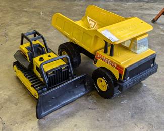 Lot 456: Metal Nylint dump truck and Tonka bulldozer; dump truck measures 17 " long