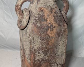 Lot 735: Pottery double handled vase measuring 19.5 " high