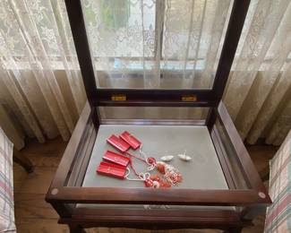 Display case, ceramic paper crane, Japanese wooden decor with tassels