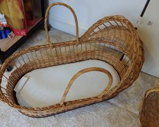 Woven basket infant carrier