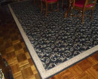 Area rug black & gold w/pad 16' x 21'
