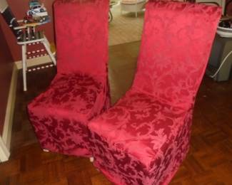 2 red matching brocade covered chairs