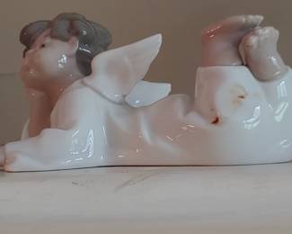 Lladro angel laying down