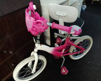 Pink & white Huffy magnificent bike