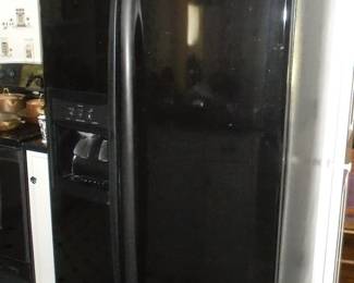 Black Kenmore Elite side by side ref/freezer w/ice and water dispenser