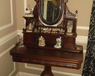 Antique 2 pc table. Bottom part 38"L x 20"W x 30" T. Top: ornate w/mirror & 2 drawers 38"L x 9"D x 38" T. Over height is 68".