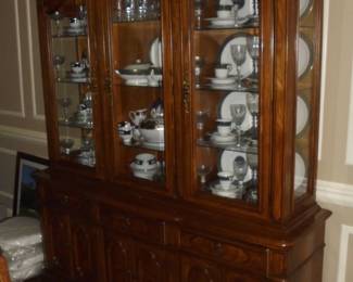 2 pc china cabinet w/ 6 doors (3 wood & 3 glass) & 3 drawers. Base: 72" L x 21"W x 21"T Top: 64"L x 15" W x 16"D