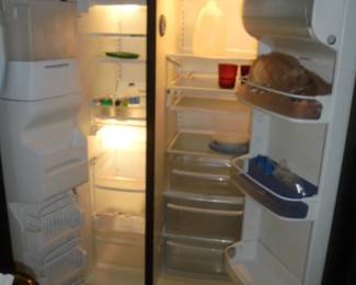 Black Kenmore Elite side by side ref/freezer w/ice and water dispenser