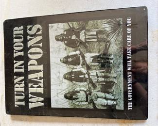 Metal sign with Native Americans. reproduction sign