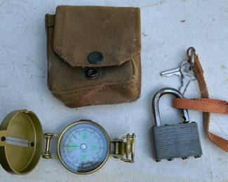 Compass with case  and padlock. 