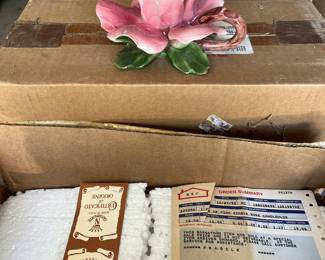 Capodimonte rose candle holders. There are 16 of these new in boxes. 