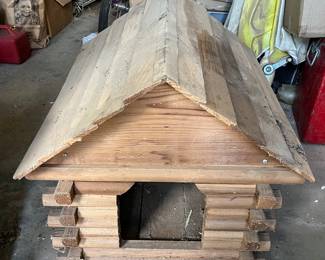 Log dog house. 