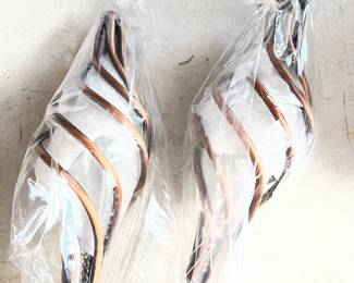 Two hanging twirling glass decorations. New. EACH HAVE A CHAIN ON THEM LIKE A WIND CHIME