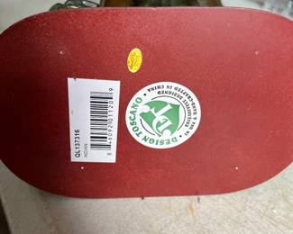 Bottom of Indian figure by Toscano. 